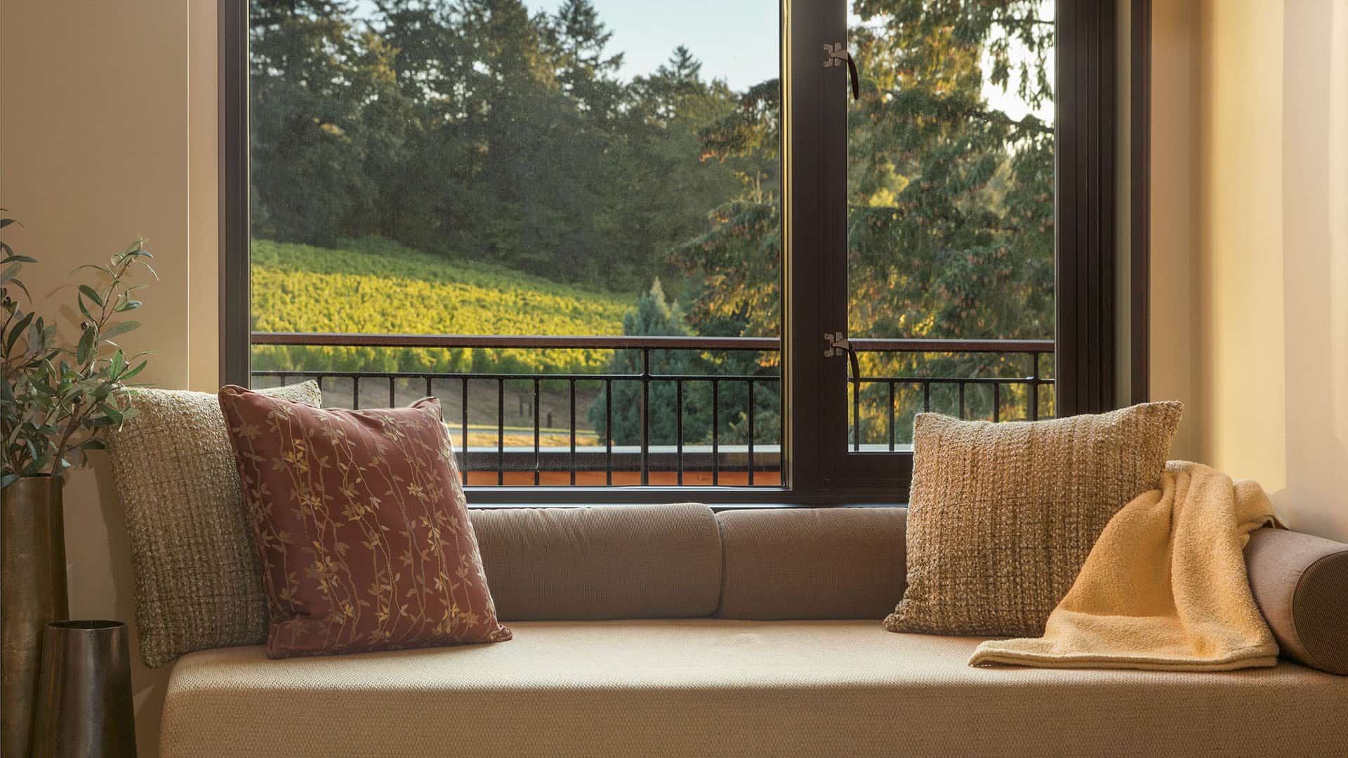 Guest room window seat with a view of the vineyard.